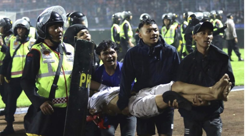 Indonesia soccer stampede kills 125 after police use tear gas in stadium